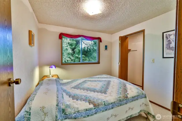 Bedroom 1 with lighted closet.