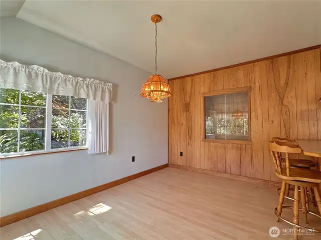 Laminate flooring upgrade in dining and kitchen.