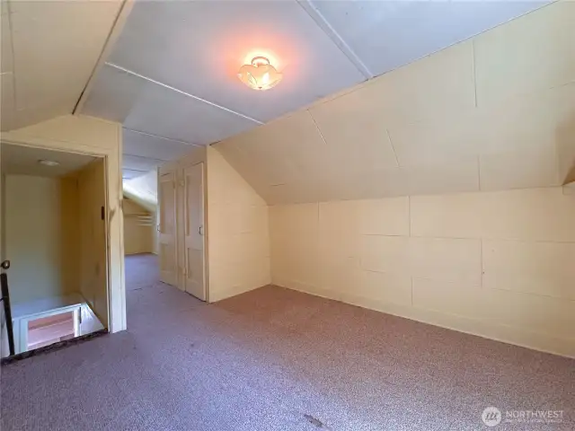 Upstairs additional bedroom and bonus room space.