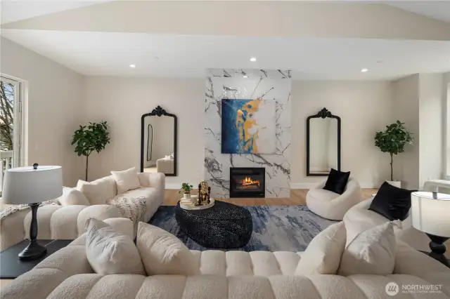 Spacious living room with fireplace, perfect for gatherings.