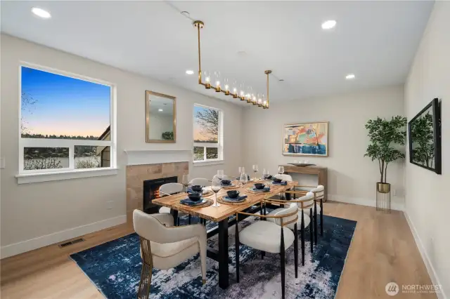 Dining room with fireplace and view of Lake Washington. Great place for a meal and a view.