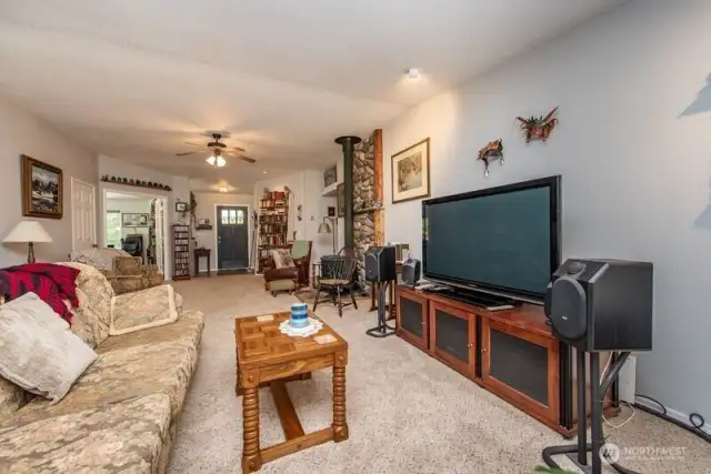 living room with wood stove