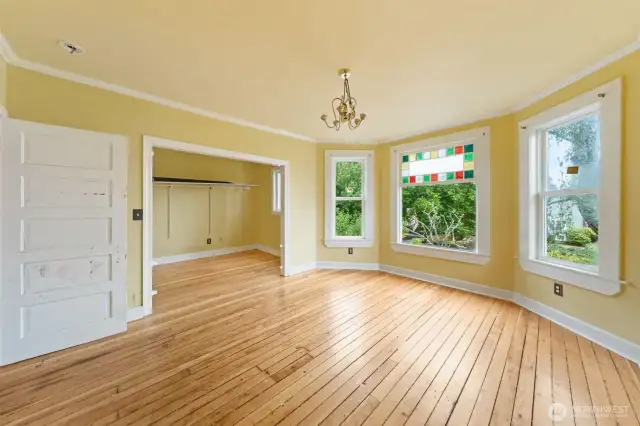 Spacious primary bedroom with massive walk-in closet.