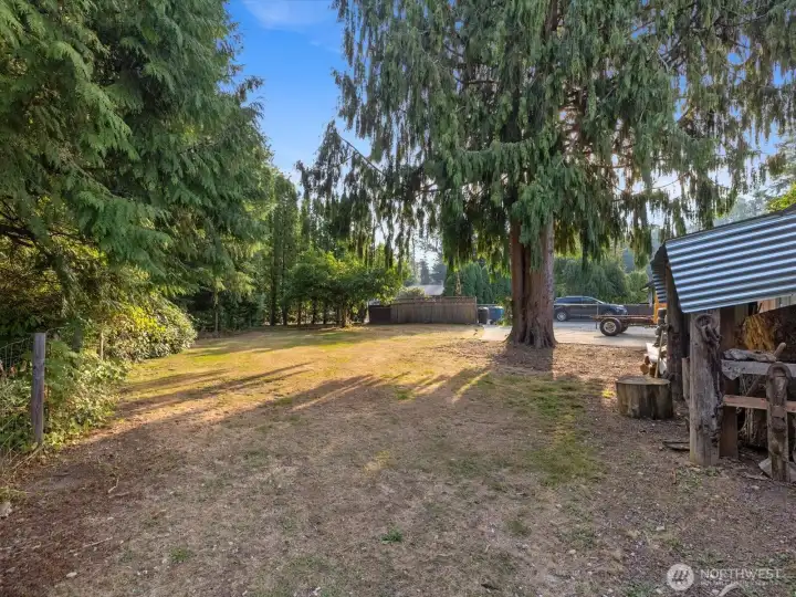 Private yard is fully fenced and features mature landscaping. No HOA.