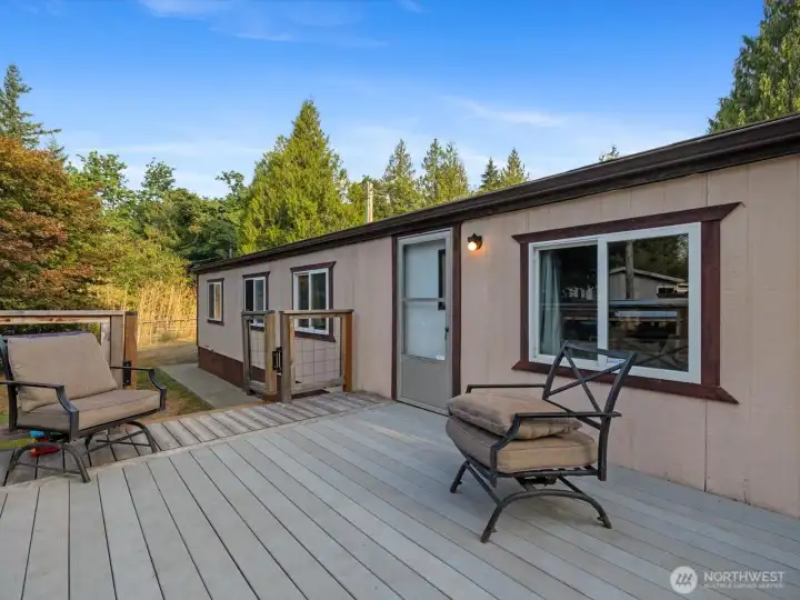 Rear deck offers outdoor living space.
