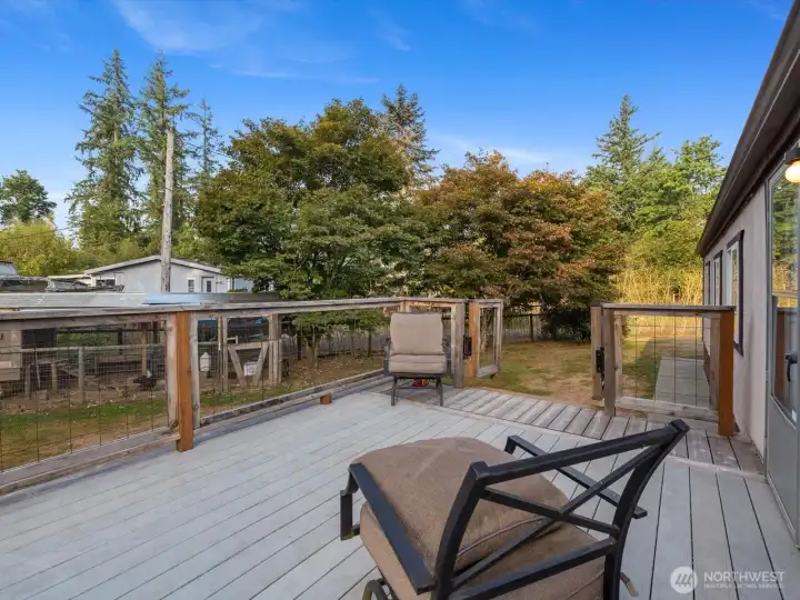 Rear deck offers outdoor living space.