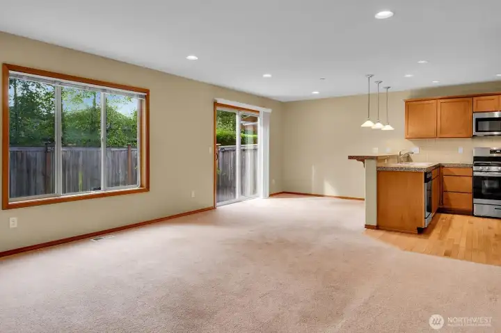 Living Room View to Dining Room and Kitchen