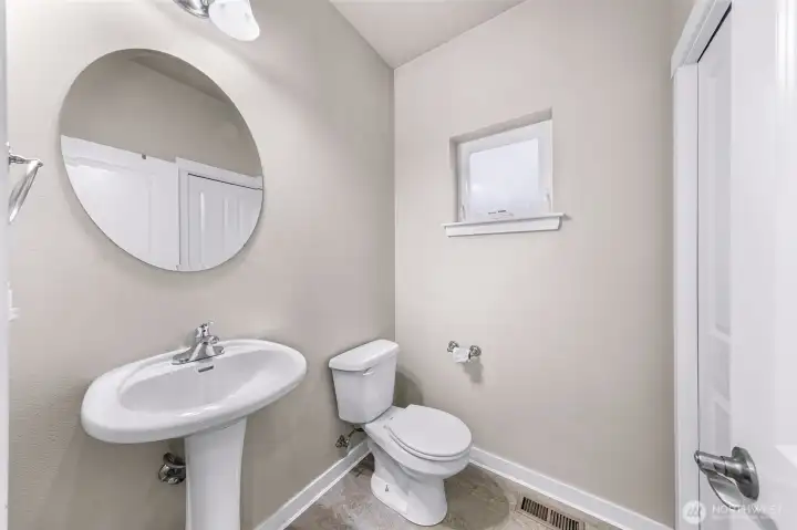 Downstairs Powder Room with new flooring