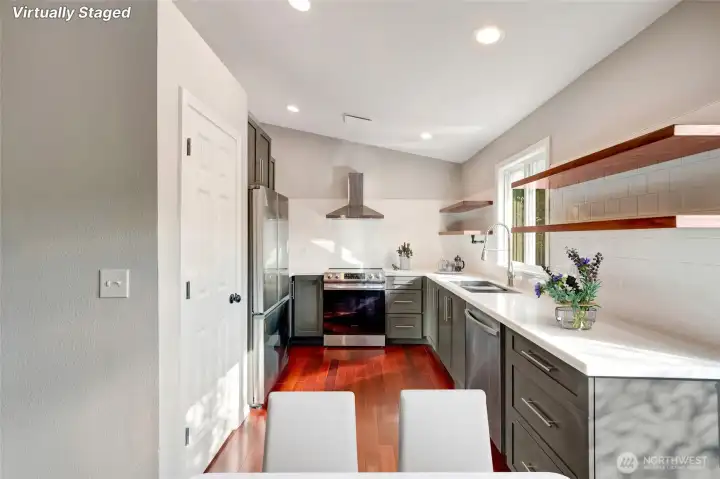 The kitchen, bathed in sunlight, is both functional and inspiring.