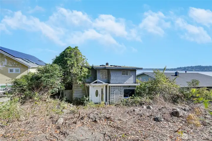 Another view of the old house, highest and best use is to remove and put your dream home there.