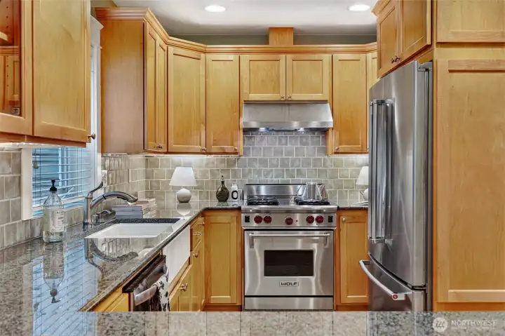 Stainless appliances including WOLF range.  Beautiful cabinetry.