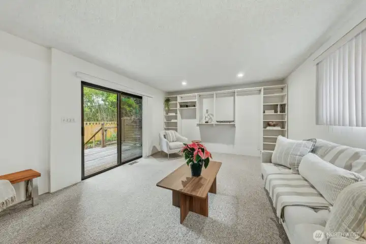 Sweet deck opens to the fully fenced back yard.