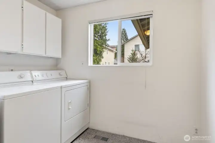 Utility room off the kitchen on the main floor.