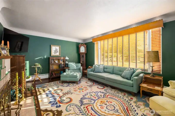 The Living room has a fireplace, coved ceilings & a lighted wood valance.