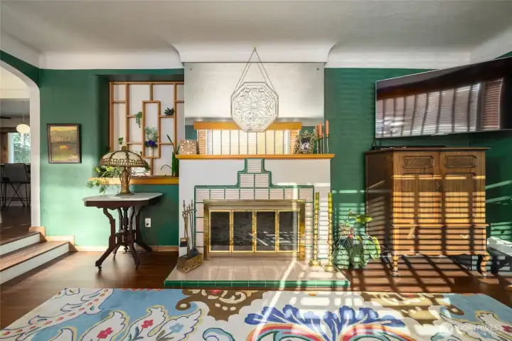 There is a planter to the left of the fireplace.