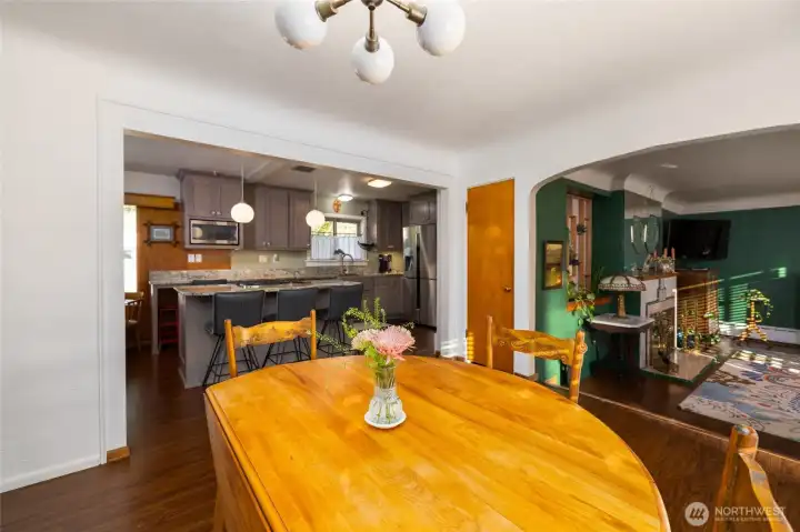 This is a view from the dining room to the living room & kitchen.
