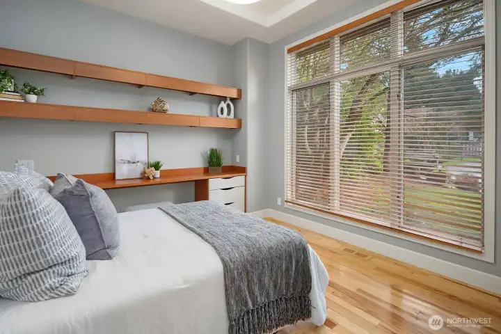 Main level guest suite with attached 3/4 bath.