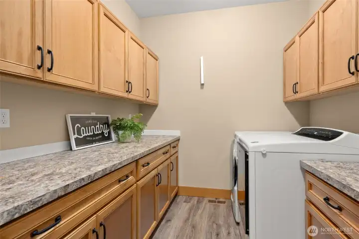 Laundry room with plenty of built in storage