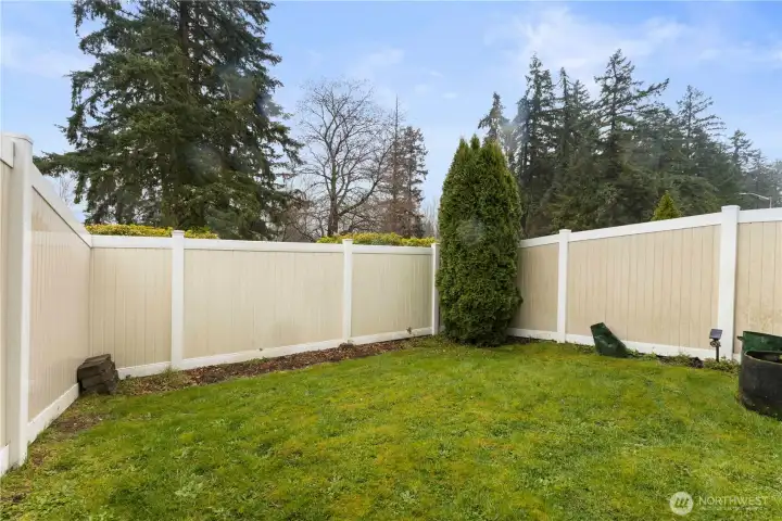 The fenced yard offers space for pets & play. Add in some raised garden beds and grow your own flowers or veggies.