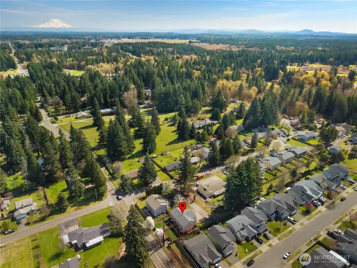 Overhead view of the home and surrounding community