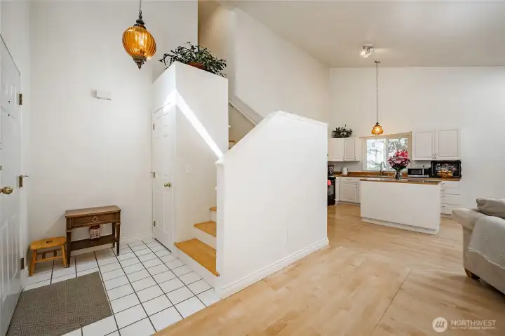 Step inside to a beautifully refreshed interior, where fresh paint and newly refinished hardwood floors enhance the home’s light-filled, open feel.