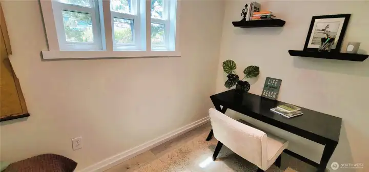 A stylish first-floor bathroom featuring carefully selected designer colors that enhance the space with warmth and sophistication.