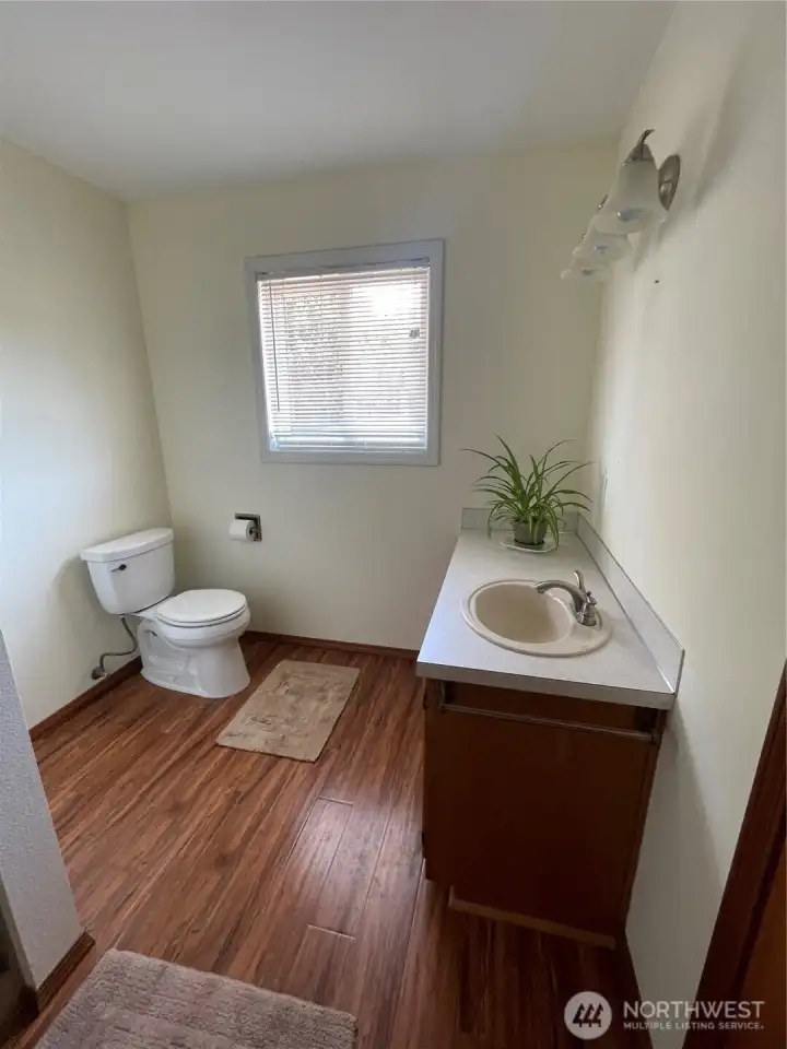 Upstairs half bath.