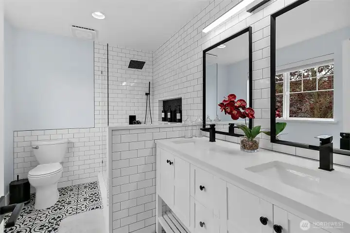 upstairs guest bathroom with custom tile walk in shower