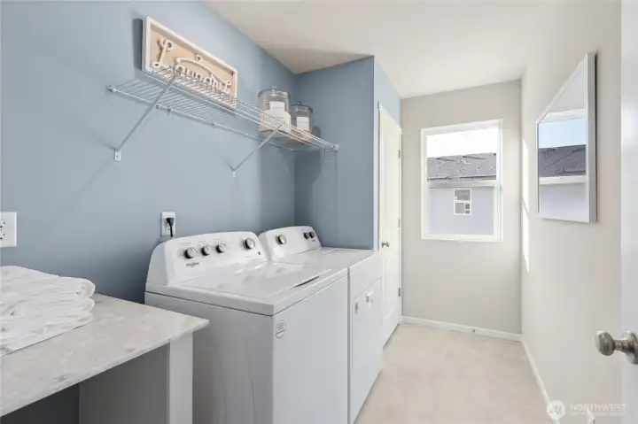 Convenient upper-level laundry room. Photos are representative only and may display different color package and/or upgrades.