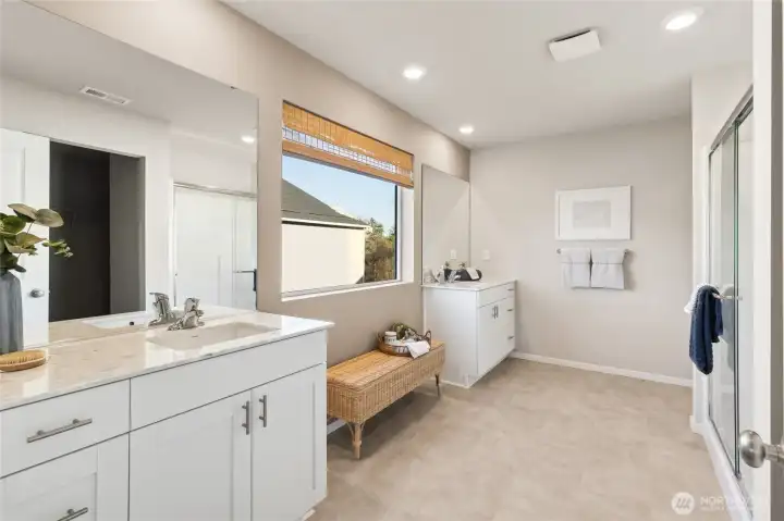 Luxurious primary en-suite bathroom. Photos are representative only and may display different color package and/or upgrades.