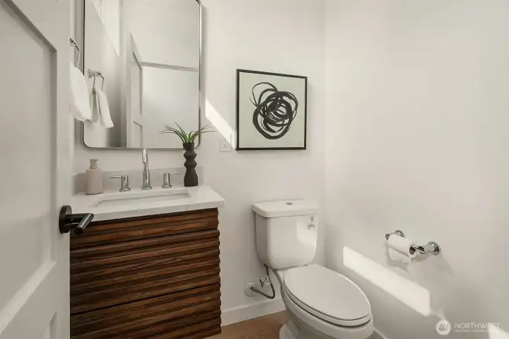 Powder bathroom on kitchen/dining/living level.