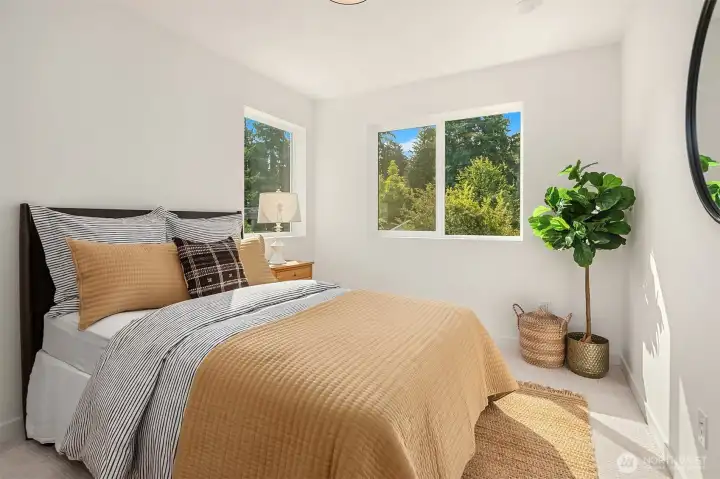 Upper-level guest bedroom.