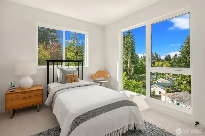 Additional upper-level guest bedroom.