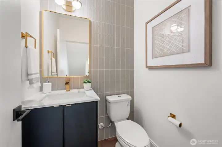 Half bath on main floor for convenience Half bath on main floor for convenience