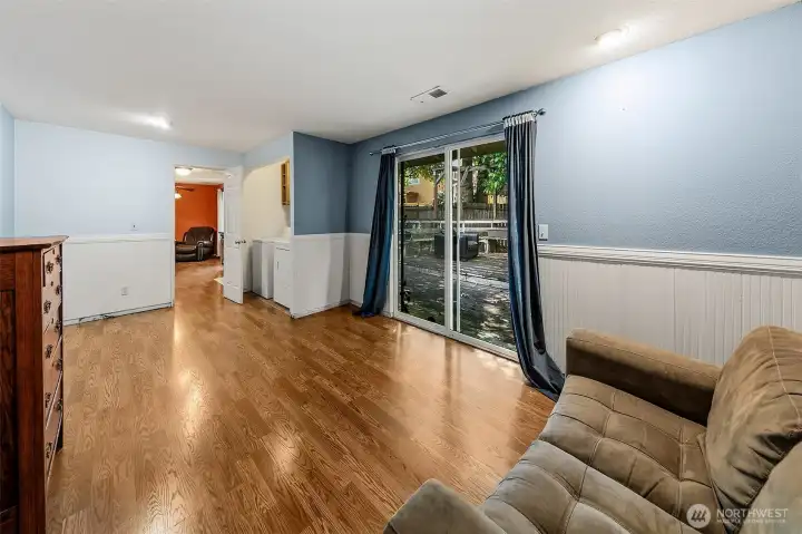 Great room with sliding glass door to deck and backyard Great room with sliding glass door to deck and backyard