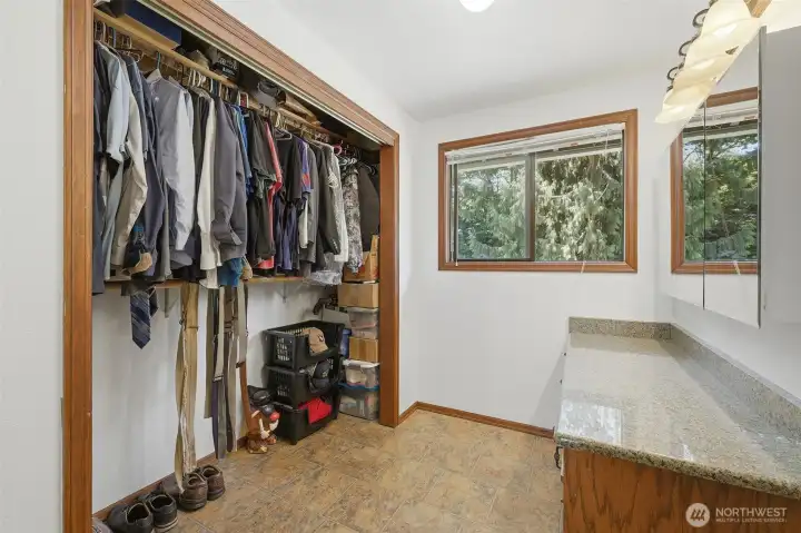 Primary bedroom closet area. Primary bedroom closet area.