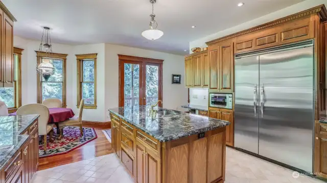 Natural light streams in from large windows, illuminating the beautiful tile floors and intricate details throughout.