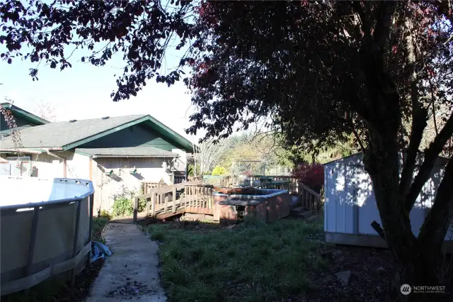 walk way between large shop and main home