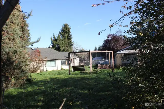 fenced middle yard, great space for play area or dog run