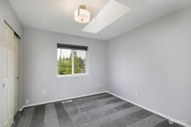 Third upstairs bedroom w/ 2x4 skylight