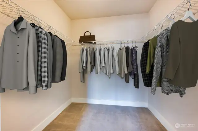 Guest bedroom has a walk-in closet too for maximum storage.