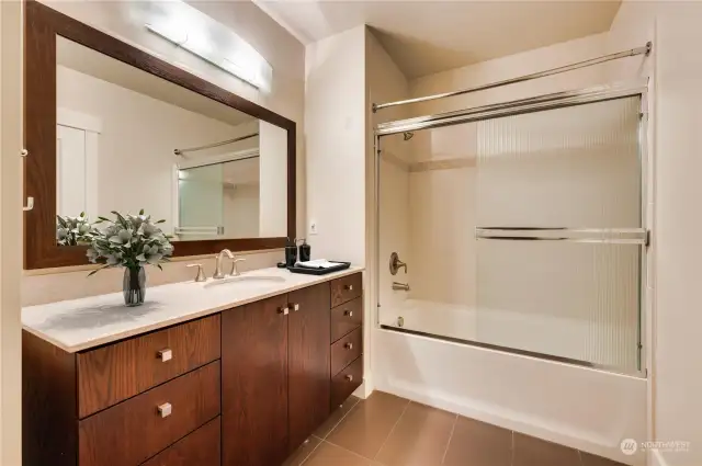 Lovely guest bath is next to the guest bedroom for convenience.