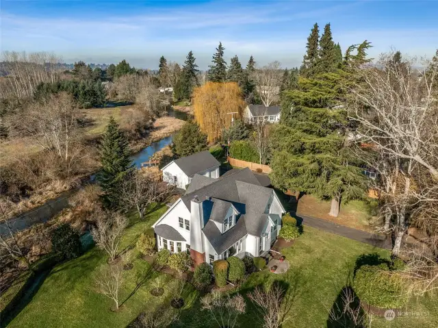 Welcome to this enchanting storybook home, nestled along the serene waters of Clark’s Creek! Overflowing with character and timeless charm, this one-of-a-kind property offers a perfect blend of storybook whimsy and modern convenience.