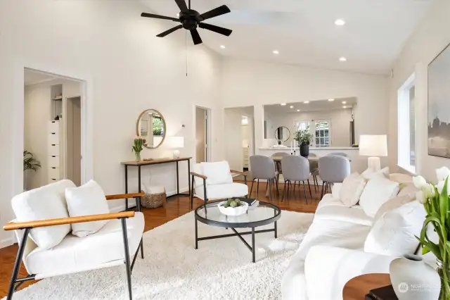 Inviting living room with lots of natural light and vaulted ceilings