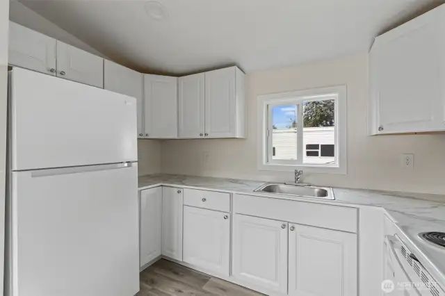 all new kitchen.  Lower left corner Lazy Susan cabinet.