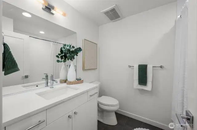 Photos of model home 9213 with similar finishes & floor plan.