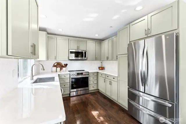 New cabinets, appliances, sink, cabinets - Chef's dream kitchen!  Gorgeous colors and attention to detail! Pull out garbage cans, tall pantry shelving next to fridge.  Thoughtful design decisions.