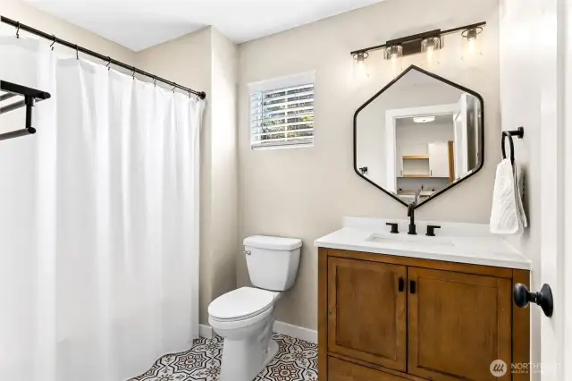 Remodeled hall bath. Come check out the dynamic flooring!