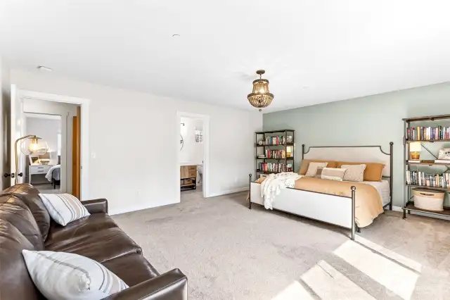 Enormous primary suite with a large walk in closet.