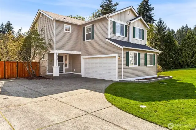 2-car attached garage with built in storage benches.
